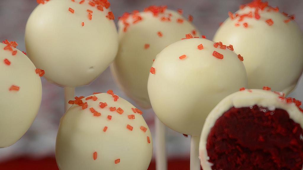 Organic Red Velvet Cake Pop · Smooth red velvet cake mixed with cream cheese and dipped in white chocolate only for you!