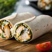 Chicken Caesar Wrap · Fresh Wrap made with Grilled chicken, parmesan cheese, croutons, and Caesar dressing.