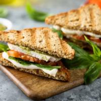 Chicken Parmesan Panini · Fresh juicy grilled chicken, house marinara sauce, basil, Parmesan, and fresh mozzarella che...