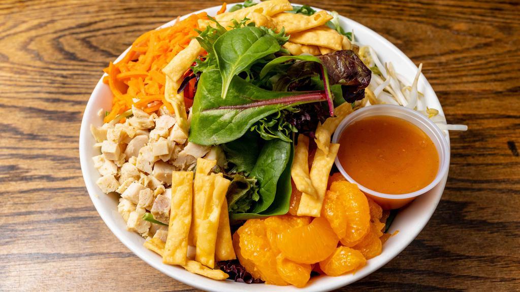Asian Salad · Mix greens, Marinated baked chicken, bean sprouts, shredded carrots, scallions, oranges, and crispy wonton noodles with Ginger Mandarin dressing.