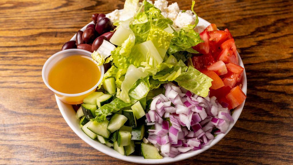 Greek Salad · Romaine, slice olives, red onions, cucumber, tomatoes, and feta cheese with house dressing.(olive oil-red wine vinegar-salt and pepper)