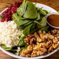 Red & White Salad · Baby Spinach, beets, walnuts, and goat cheese with Balsamic Vinaigrette Dressing.