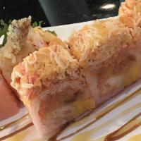 Angry Dragon Roll · Tempura shrimp, spicy tuna, mango inside with soybean paper spicy blue crab and crabmeat on ...