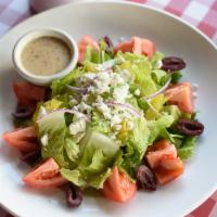 Greek Salad · Romaine lettuce, kalamata olives, pepperoncini, tomatoes, red onion, feta cheese with medite...