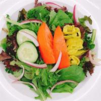 Garden Salad · Baby green, tomatoes, cucumbers, pepperoncini and red onions.