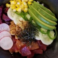 Mix Poke Bowl · Ahi tuna, salmon, avocado, corn, cucumber, jalapeño, fried onion, nori, with sushi rice seas...