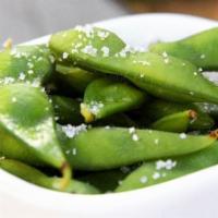 Edamame · Steamed young soybeans tossed in sea salt.