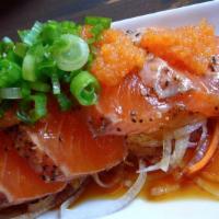 Salmon Tataki · Seared salmon in ginger ponzu sauce.
