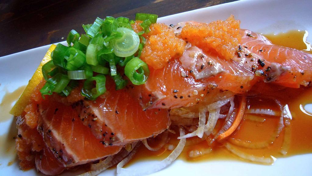 Salmon Tataki · Seared salmon in ginger ponzu sauce.