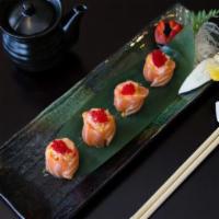 Edo Flower · Lobster salad, kani, mango, wrapped with salmon.