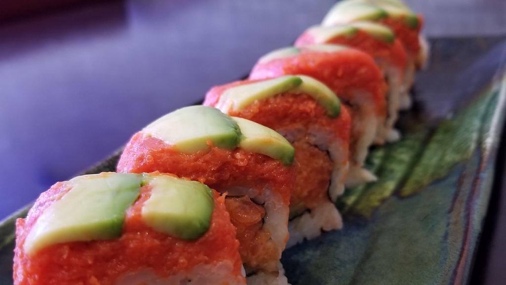 Fire Dragon Roll · Spicy salmon and cucumber inside, top with spicy tuna and avocado.
