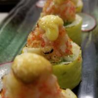Soho Roll · Eel avocado and squid inside the roll, top with spicy crunchy scallop, wrap with soy paper. ...