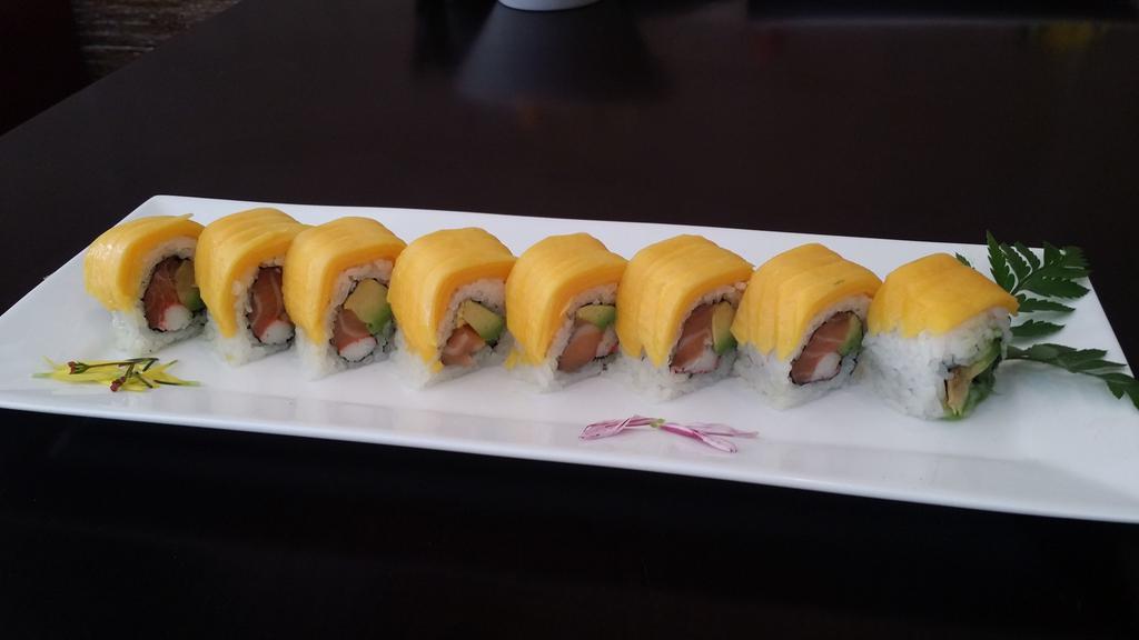 Yellow Dragon Roll · 8 pieces. Salmon, avocado, crab meat, topped with mango and special sauce.