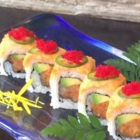 Dynamite Roll · Spicy. 8 pieces. Spicy yellowtail, avocado, crunch, topped with lobster salad, jalapeño and ...
