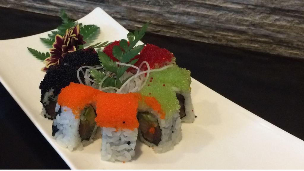 4 Season Roll · 8 pieces. Tuna, salmon, yellowtail, avocado and cucumber, topped with, topped with color tobiko.