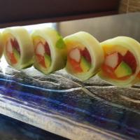 Naruto Roll · 6 pieces. Tuna, salmon, white fish, avocado, tomago and crab meat wrapped in cucumber.