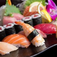 Sushi And Sashimi Combination · 5 pieces of sushi, 12 pieces of sashimi and 1 california roll. Served with miso soup or salad.