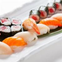 Sushi Deluxe · 10 pieces of sushi and 1 roll eel avocado. Served with miso soup or salad.