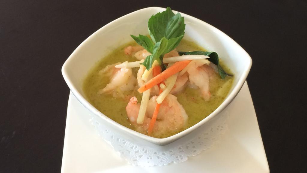 Thai Coconut Green Curry · Hot and spicy. Onion, carrot, pepper, bamboo shoots, string bean and zucchini.