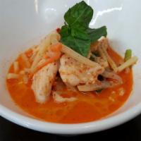 Thai Coconut Red Curry · Hot and spicy. Onion, carrot, pepper, bamboo shoots, string bean and zucchini.
