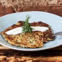 Zucchini Pancakes · Dill, parsley, scallion, feta, egg, flour.