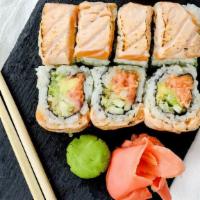Home Run Roll · Spicy crunchy tuna with cucumber and avocado topped with seared salmon.