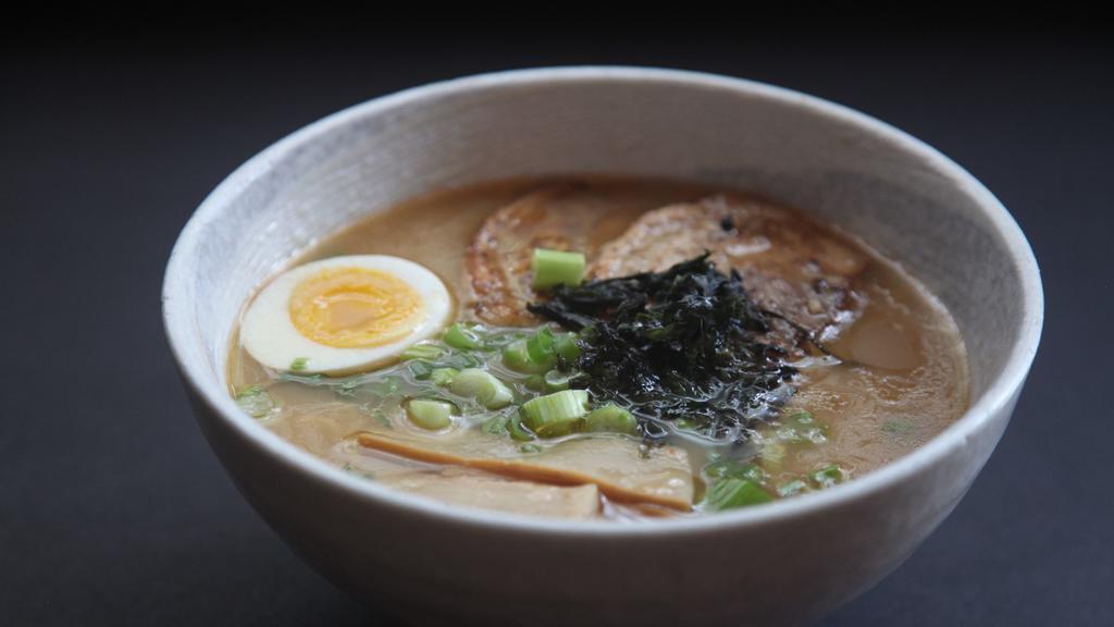 Shoyu Ramen · Noodle soup made with rich and deep flavored soy sauce. Topped with chasyu (pork), menma, egg, scallion, and seaweed.