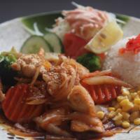 Spicy Chicken Teriyaki · Pan-fried chicken breast with spicy sauce, served with rice, cabbage, oshinko, corn, and bro...