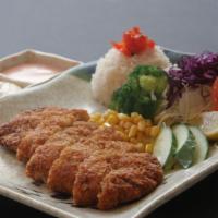 Fish Katsu · Breaded fish cutlet served with rice, cabbage, corn, broccoli, and oshinko.