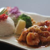 Shrimp Teriyaki · Pan-fried shrimp with teriyaki sauce, served with rice, cabbage, corn, broccoli, and oshinko.