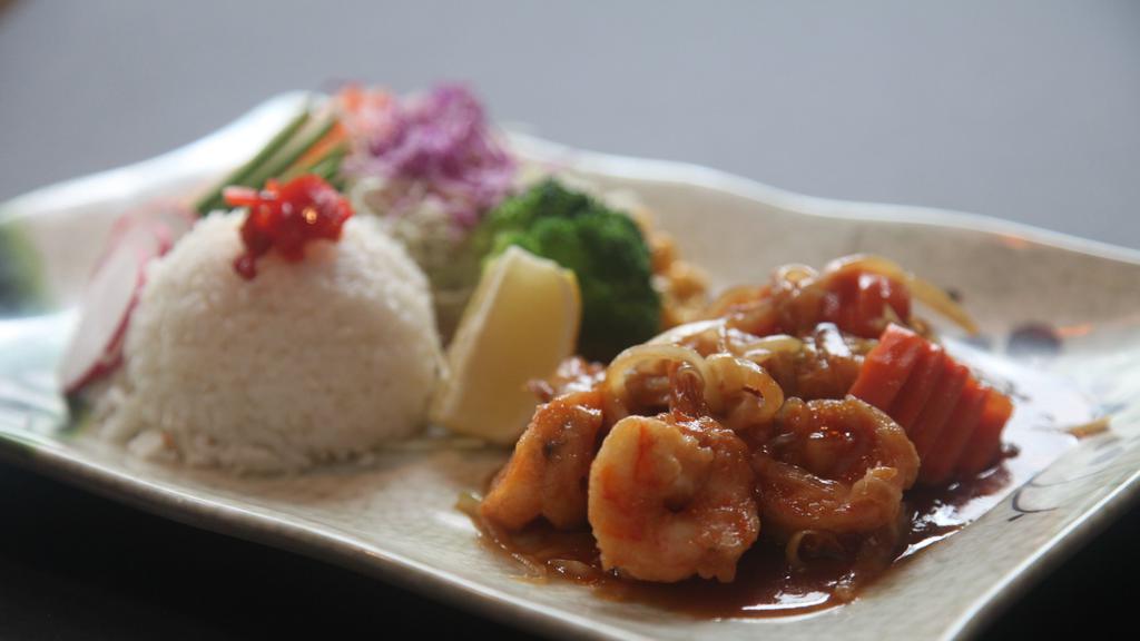 Shrimp Teriyaki · Pan-fried shrimp with teriyaki sauce, served with rice, cabbage, corn, broccoli, and oshinko.