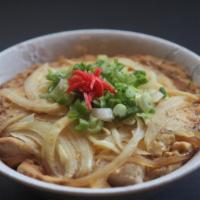 Oyako Don · Rice bowl topped with simmered chicken, egg and onion. Topped with scallion and ginger.