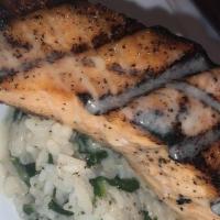 Grilled Salmon · Lemon butter sauce and spinach rice.