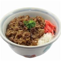 Beef Donburi · Bowl of steamed rice topped with sliced beef cooked in a sweet soy broth.
