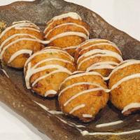 Fried Takoyaki (6 Pieces) · Fried dough ball with minced octopus inside (takoyaki sauce, mayonnaise, and sprinkled with ...