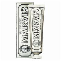 Marvis Whitening Mint - 75 Ml · Elevate your brush time with Marvis Whitening Mint Toothpaste.
 
 Cold mint’s icy shiver and...