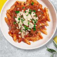 Tangy Tomato Pasta (Vegan Penne) · (Vegetarian) Fresh penne pasta cooked in a spicy tomato and topped with black pepper, parsle...