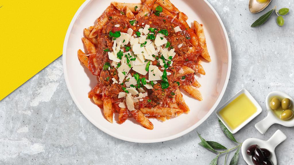 Tangy Tomato Pasta (Vegan Penne) · (Vegetarian) Fresh penne pasta cooked in a spicy tomato and topped with black pepper, parsley, and parmesan.