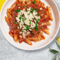 Bluffing Bolognese Pasta (Vegan Penne) · Fresh penne pasta cooked in a meaty bolognese sauce and topped with black pepper, parsley, a...