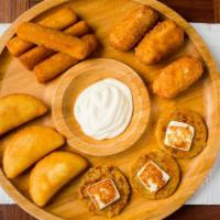Mini Platter · Three tequenos, three mini capachas, three mini empanadas and four fried yuca.