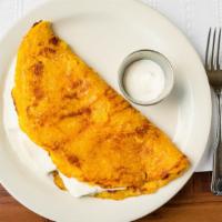 Cachapa · Arepa de choclo. Sweet fresh corn pancake served with melted guayanes cheese.