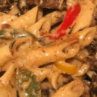 Rasta Pasta (Oxtail) · PENNE PASTA, RED PEPPERS, GREEN PEPPERS, PARMESAN CHEESE, CREAM ;LOADED WITH OXTAIL