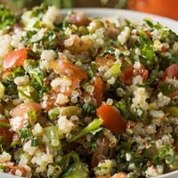 Quinoa Salad · Baby kale, quinoa, roasted beets, toasted almonds and fresh ricotta