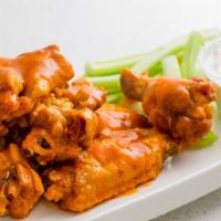 Buffalo Wings · 8 Jumbo Wings Tossed In Choice Of Mild, Medium, Hot, BBQ Or Honey Garlic Sauce. Served w/ Bl...