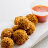 Mozzarella Balls · 8 seasoned and lightly-fried mozzarella balls.