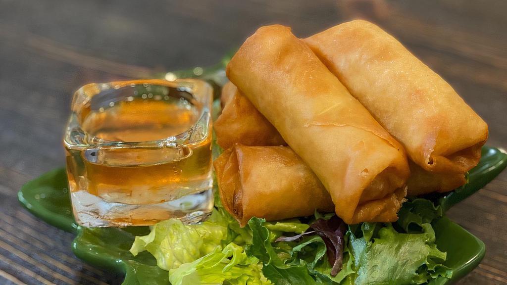 Spring Roll · Most popular. Vegetarian. Crispy roll filled with carrot, cabbage, and glass noodle with plum sauce.
