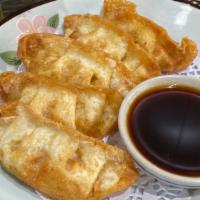 Fried Veggie Dumpling · Vegetarian. Crispy vegetable dumpling served with soy vinaigrette dipping sauce.