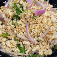 Larb Chicken Salad · Spicy. Ground chicken with red onion, scallion, mint, and ground roasted rice, with chili-li...