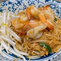 Pad Thai · Traditional popular noodle dish. Sautéed rice noodles with egg, scallions, black tofu, beans...