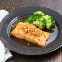 Tamarind Salmon · Spicy. Grilled salmon with steamed broccoli topped with tangy tamarind sauce.